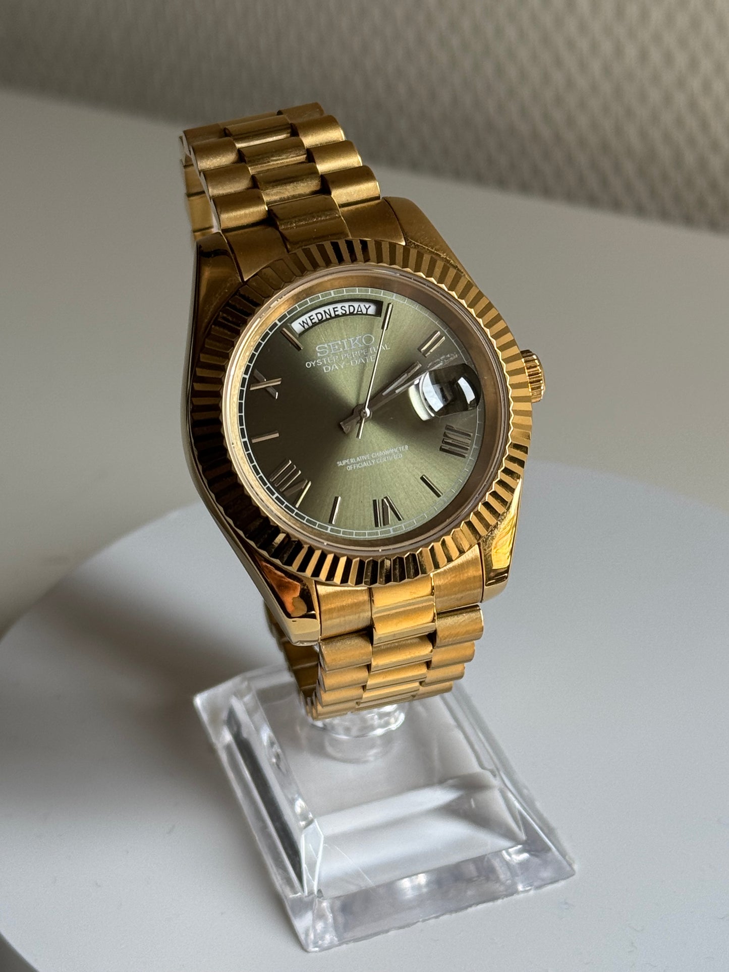 Seiko date mint groen goud