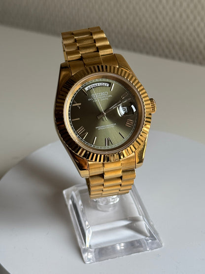 Seiko date mint groen goud