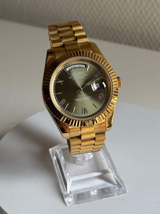Seiko date mint groen goud